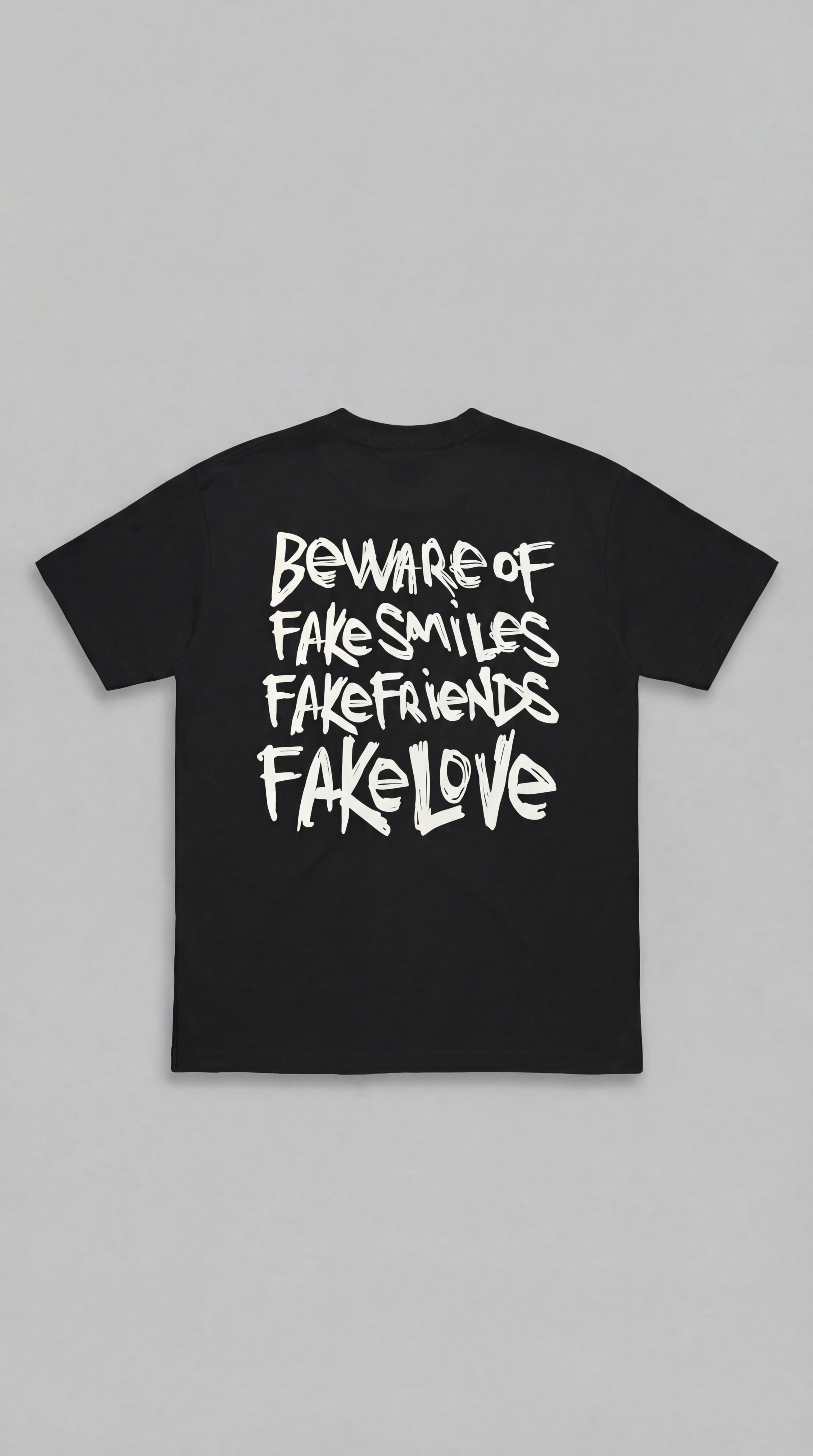 LOVEUS "Beware of Fake" Heavyweight Graphic T-Shirt in black. Back view against white background.