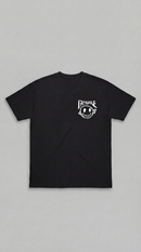 Black LOVEUS "Beware of Fake" cotton t-shirt with a smiley face logo on the chest against a gray background. 