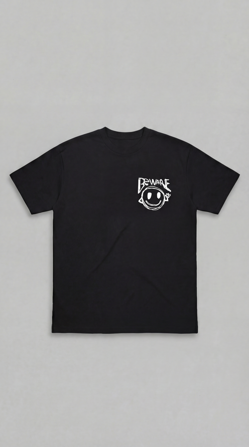 Black LOVEUS "Beware of Fake" cotton t-shirt with a smiley face logo on the chest against a gray background. 