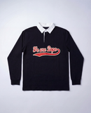 A detailed studio product shot of the black Loveus We Are Dope Cursive Rugby Polo against a clean white background, highlighting the crisp white collar and the premium red cursive tackle twill lettering.