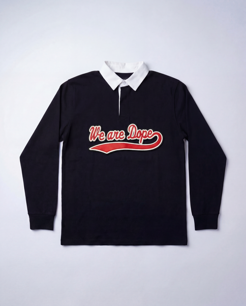 A detailed studio product shot of the black Loveus We Are Dope Cursive Rugby Polo against a clean white background, highlighting the crisp white collar and the premium red cursive tackle twill lettering.